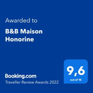 Ett certifikat, pris eller annat dokument som visas upp på B&B Maison Honorine