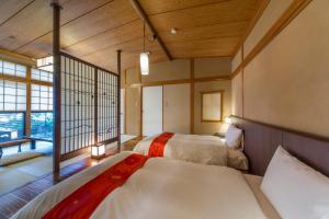 Letto o letti in una camera di Toushinan Komeya
