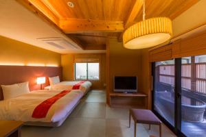 Letto o letti in una camera di Toushinan Komeya