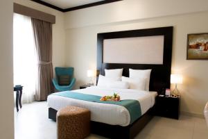 Ramada by Wyndham Karachi Creek客房内的一张或多张床位
