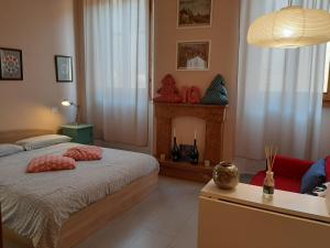 Ένα ή περισσότερα κρεβάτια σε δωμάτιο στο Il Cielo in Una Stanza