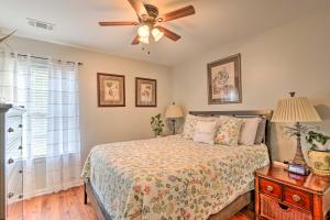 A bed or beds in a room at Bluffton Getaway Fenced Yard, 7 Mi to Beach!