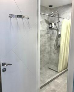Koupelna v ubytování Studio Apartment NFT New Gudauri Atrium 130