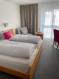 Letto o letti in una camera di Pension Arcade