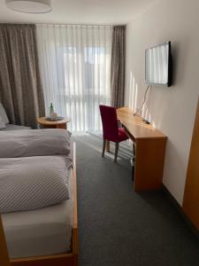 Letto o letti in una camera di Pension Arcade