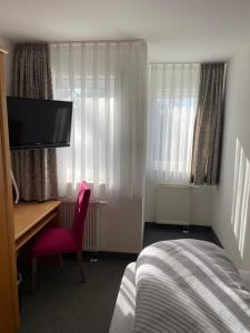 Letto o letti in una camera di Pension Arcade