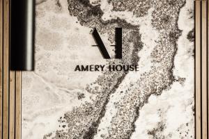 a book with the number and the words energy house at Amery House in Sliema