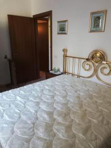 Llit o llits en una habitació de Casa-Vacanze I Vecchi Valori Umbria