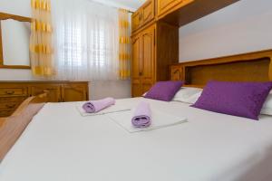 Posteľ alebo postele v izbe v ubytovaní Ivan Centar Makarska