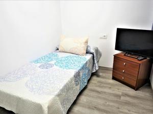 Postel nebo postele na pokoji v ubytování Villa Service - Guimera