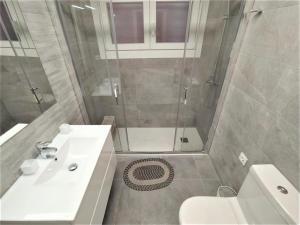 Koupelna v ubytování Villa Service - Guimera