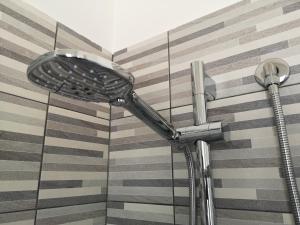 a shower head on the side of a building at Villa Caravaggio Comfort e Relax in Rocca San Giovanni