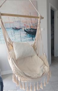 Ένα ή περισσότερα κρεβάτια σε δωμάτιο στο Lighthouse Apartment