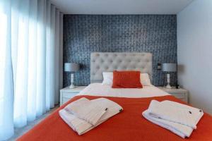 Postel nebo postele na pokoji v ubytování T2 Fonte da Vila