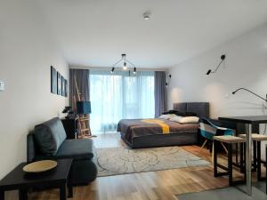 Ruang duduk di EASY RENT APARTAMENTS - Silver 9, Basen & SPA, Centrum Free Parking 24h Check-in +12 gambar