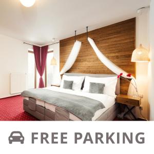 Postel nebo postele na pokoji v ubytování Hotel Sharingham