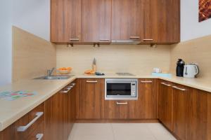 Kuchyň nebo kuchyňský kout v ubytování Villa 4 Pory Roku by Noclegi Renters