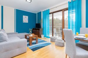 Posezení v ubytování Villa 4 Pory Roku by Noclegi Renters + 37 fotografií