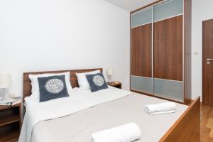 Postel nebo postele na pokoji v ubytování Villa 4 Pory Roku by Noclegi Renters