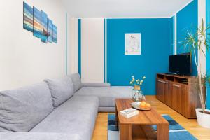 TV a/nebo společenská místnost v ubytování Villa 4 Pory Roku by Noclegi Renters