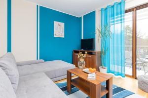 TV a/nebo společenská místnost v ubytování Villa 4 Pory Roku by Noclegi Renters