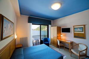 Postel nebo postele na pokoji v ubytování Hotel Europa