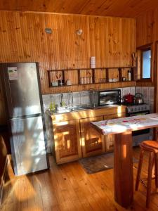 Kuchyň nebo kuchyňský kout v ubytování CABAÑA 325 centro de QUELLON