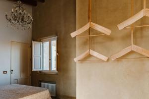 A bed or beds in a room at La pagliera