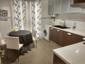 Kuchyň nebo kuchyňský kout v ubytování Bonito piso 4 habitaciones en Bétera