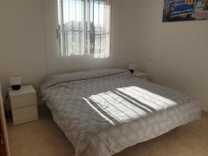 Postel nebo postele na pokoji v ubytování Sunlight Apartment - Molino Blanco - La Zenia + 22 fotografií