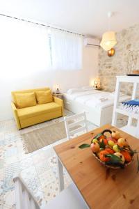 A seating area at Ravi Boutique Home - 1 minute walk from beach