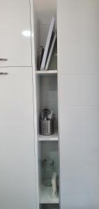 Kuchyň nebo kuchyňský kout v ubytování CARLOS APARTAMENTo