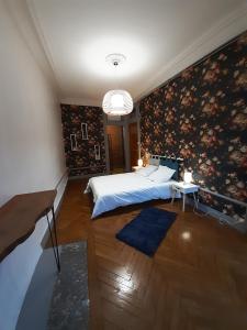 Posteľ alebo postele v izbe v ubytovaní Tulle Centre : grand et bel appartement