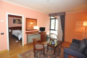 TV a/nebo společenská místnost v ubytování Hotel Hermitage