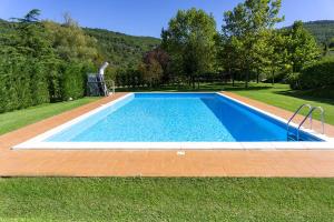 Bazén v ubytovaní Agriturismo Le Fornaci - Appartamento Bianco alebo v jeho blízkosti