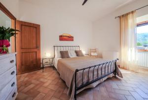 Posteľ alebo postele v izbe v ubytovaní Agriturismo Le Fornaci - Appartamento Bianco + 12 fotografií