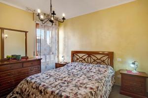 Ένα ή περισσότερα κρεβάτια σε δωμάτιο στο Casa Laura Elena