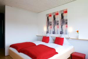 Postel nebo postele na pokoji v ubytování Bed & Breakfast Rotes Haus