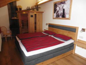 Postel nebo postele na pokoji v ubytování Gästehaus Dominik