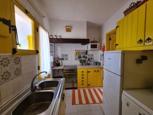 Kuhinja oz. manjša kuhinja v nastanitvi Aldeia do Golf - Vila I8