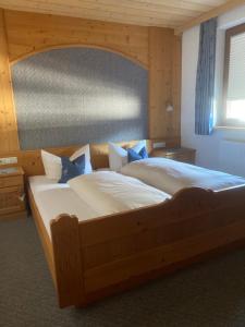 Cama ou camas em um quarto em Haus Schnöller