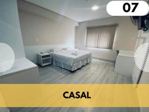 Ένα ή περισσότερα κρεβάτια σε δωμάτιο στο Hotel Serra do Itaqueri