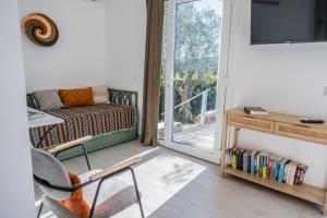 En eller flere senger på et rom på Gato Preto de Silves - Adults Only