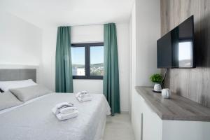 Posteľ alebo postele v izbe v ubytovaní Penthouse Adriatic Blue