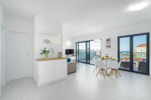 Kuchyňa alebo kuchynka v ubytovaní Penthouse Adriatic Blue
