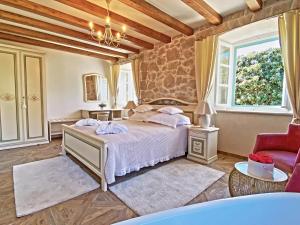 Кровать или кровати в номере Villa Princess Captislava