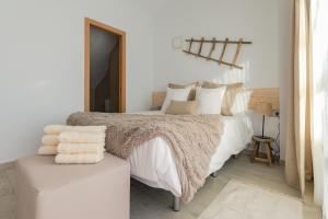 Voodi või voodid majutusasutuse Arcasa by Villas Rinamar toas