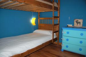 A bed or beds in a room at Gestiona2R - Casa rural Matias Mar y Montaña ideal Familias