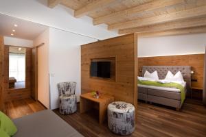Llit o llits en una habitació de Hotel Tannenberg