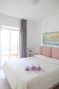Posteľ alebo postele v izbe v ubytovaní Casa Maadry